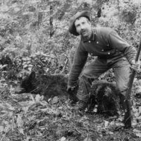 Jack Bean with a bear.