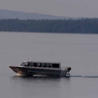 A commercial tour boat cruises Yellowstone Lake in Yellowstone National Park. (Yellowstone Gate/Ruffin Prevost)