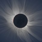 Solar flares are visible in the sun's corona during a total solar eclipse. (NASA image)