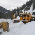 Crews work earlier this spring to plow Sylvan Pass, the highest point along the east entrance road into Yellowstone National Park. (National Park Service photo - click to enlarge)