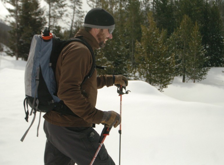 Doug Kraus, a firefighter who lives in Mammoth, skis into the Yellowstone National Park backcountry near Top Notch Peak.