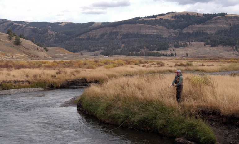Dylan Riley fishes the Lamar River in Yellowstone National Park in October 2010 while visiting from California. (Ruffin Prevost/Yellowstone Gate)