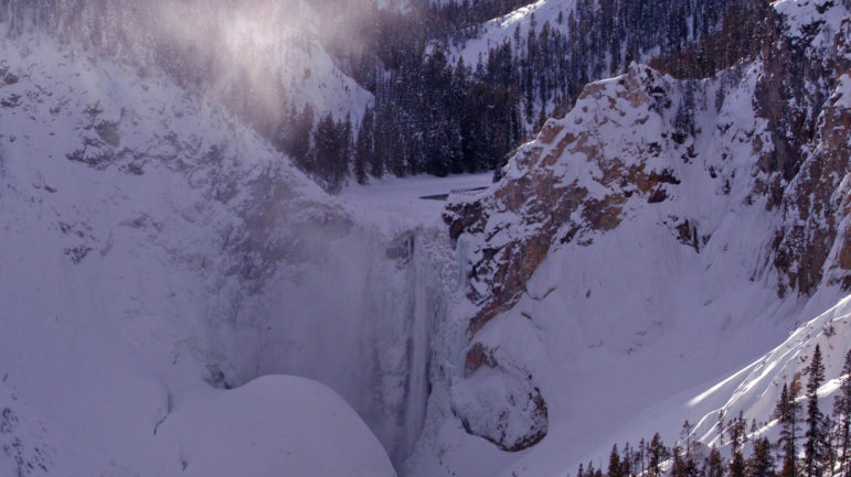 Ice forms along sections of the Lower Falls in the Grand Canyon of the Yellowstone River as seen in this 2012 file photo.