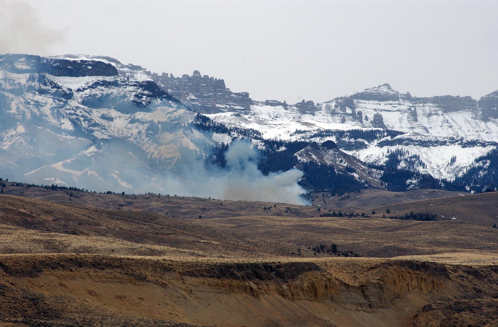 A small prescribed fire burns near the base of Carter Mountain south of Cody, Wyo. (Ruffin Prevost/Yellowstone Gate file photo - click to enlarge)