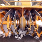 National Park Service road crews use rotary plows to clear heavy snows at the end of the winter season in Yellowstone and Grand Teton national parks. (Ruffin Prevost/Yellowstone Gate - click to enlarge)