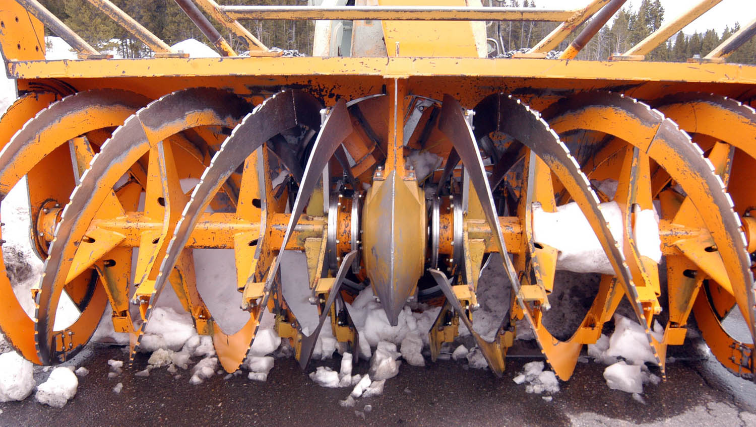 National Park Service road crews use rotary plows to clear heavy snows at the end of the winter season in Yellowstone and Grand Teton national parks. (Ruffin Prevost/Yellowstone Gate - click to enlarge)