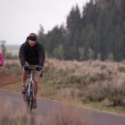 Bicyclists pedal through a mix of snow and freezing rain south of Moose Wednesday on a newly opened segment of the multipurpose pathway in Grand Teton National Park. (Ruffin Prevost/Yellowstone Gate - click to enlarge)