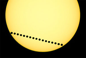 A time-sequenced composite photo shows the transit of Venus in June 2004 (photo by Fred Espenak)
