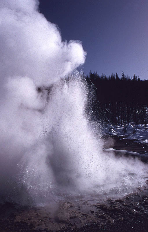 Echinus Geyser erupting in February 1993 - NPS Photo by Jim Peaco