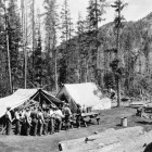 Firefighters move through a chow line during the 1937 Blackwater Fire east of Yellowstone National Park. Fifteen firefighters were killed in the blaze, and a series of events are scheduled for the 75th anniversary of the blaze. (Jack Richard photo courtesy of Buffalo Bill Historical Center McCracken Research Library PN.89.114.21398.4)