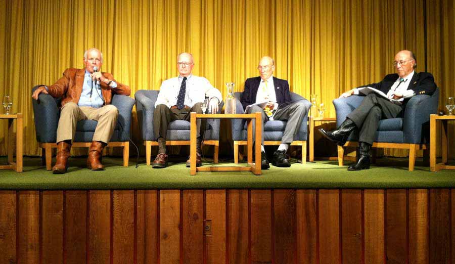 Former U.S. Fish and Wildlife Services Director John Turner, left, speaks Monday during a panel discussion in Cody that included, from left, former Environmental Protection Administration head William Ruckelshaus, former Sen. Alan Simpson and former Wyoming Gov. Mike Sullivan. (Ruffin Prevost/Yellowstone Gate - click to enlarge)