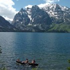 A group paddles a canoe on Jenny Lake in Grand Teton National Park. (Ruffin Prevost/Yellowstone Gate file photo - click to enlarge)