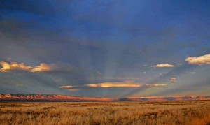A Wyoming sunset along the Polecat Bench east of Yellowstone Park produces a visual phenomenon known as anti-crepuscular rays. (©Rob Koelling - click to enlarge)