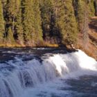 Cave Falls is 250 feet wide, making it the widest waterfall in Yellowstone National Park. It is located in the Bechler area in the southwestern corner of Yellowstone. (Ruffin Prevost/Yellowstone Gate - click to enlarge)