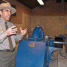 Peter Galindo, a project engineer for Yellowstone National Park, discusses a new small-scale hydro-electric power system now in use near Mammoth Hot Springs. (Ruffin Prevost/Yellowstone Gate - click to enlarge)