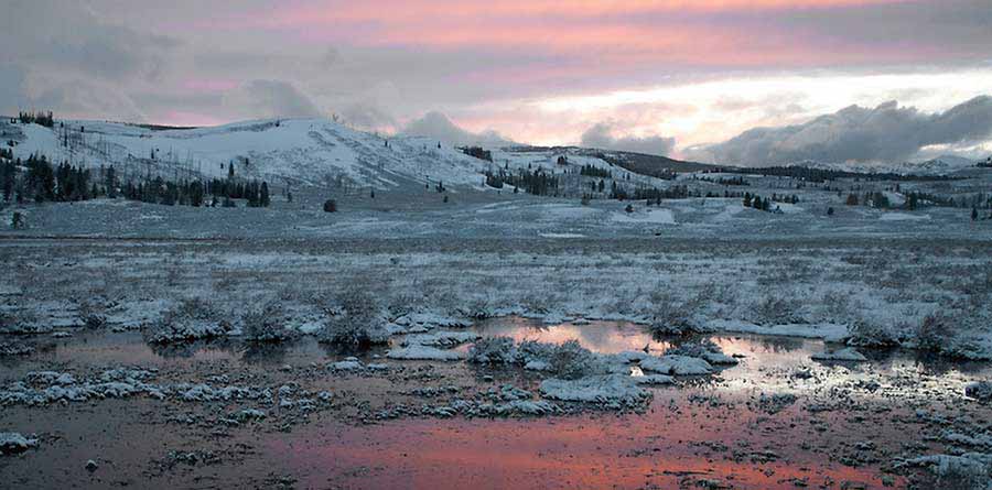 Lucky timing and a little hustle yielded an otherworldly landscape shot at Swan Lake in Yellowstone National Park. (©Meg Sommers - click to enlarge)