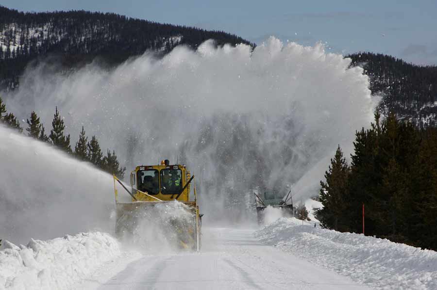 National Park Service snow plow operators clear the roads from Madison to Old Faithful. (NPS photo - click to enlarge)