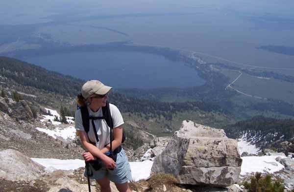 A hiker pauses along the Apex Trail in Grand Teton National Park. (NPS photo)
