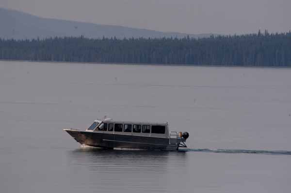 A commercial tour boat cruises Yellowstone Lake in Yellowstone National Park. (Yellowstone Gate/Ruffin Prevost)