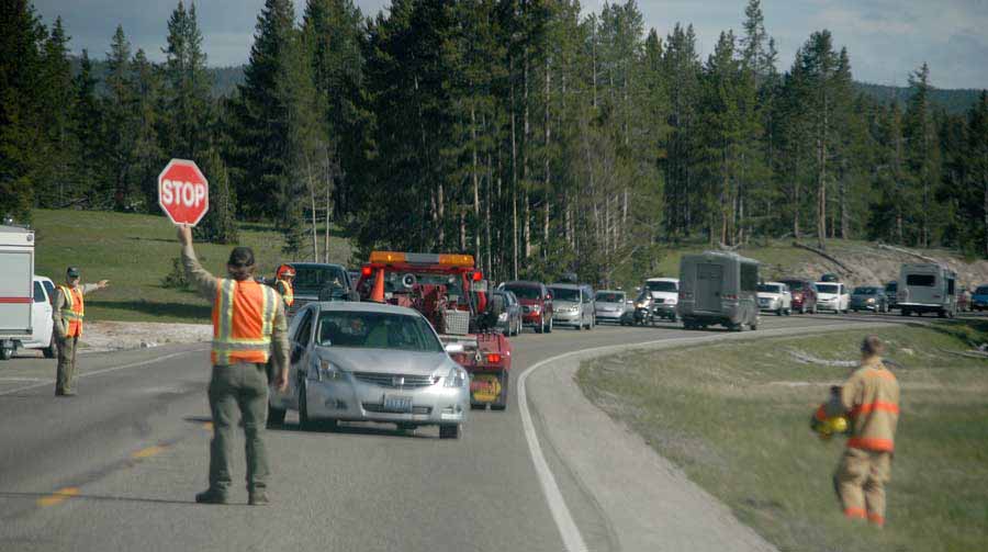 First responders manage traffic and assist victims in a vehicle accident near Madison in Yellowstone National Park. (Ruffin Prevost/Yellowstone Gate)