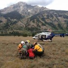 Rescue workers in Grand Teton National Park tend to climber Phil White after he was caught in a rockslide in Garnet Canyon.
