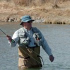 Fly-fisherman Jim Harris of Billings casts his line on the Shoshone River near the northern edge of Cody in this March 2009 file photo. Temperatures in the mid-60s lured many other fishermen to the water, which is fed by hot springs as it flows through town.