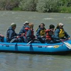 River Runners guide Larry Boyles, far left, launches a raft full of whitewater seekers into the middle of the Shoshone River, near the Belfry Highway bridge at the north edge of Cody, Wyo. in this June 2008 file photo.