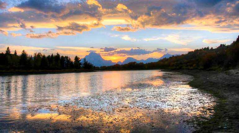 Sunlight reflects on Oxbow Bend in Grand Teton National Park. Erin Ashley Scholtz Natrona County High School