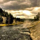 An overcast sky creates dramatic lighting along a steaming river in Yellowstone National Park. Dylan Rorabaugh Natrona County High School