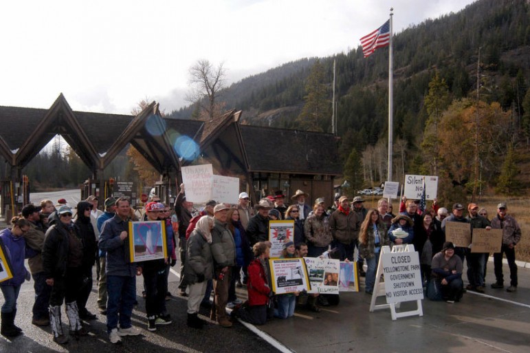 Protestors gather at the East Gate to Yellowstone National Park on Sunday to demand a solution to the federal government shutdown that has closed national parks nationwide.