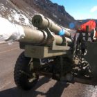 Yellowstone National Park maintenance worker Eric Holdren works last month to prepare a howitzer for use this winter in avalanche mitigation along Sylvan Pass. (Ruffin Prevost/Yellowstone Gate)