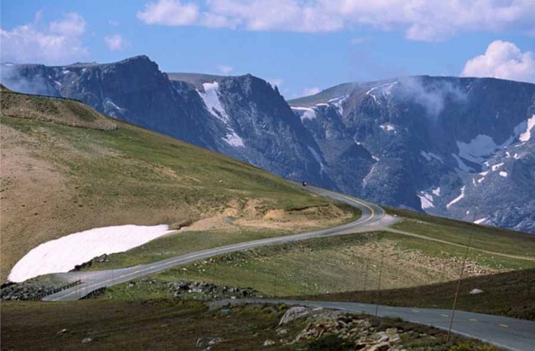 The Beartooth Highway is a high-altitude scenic byway that snakes along the Montana-Wyoming border and tops out at nearly 11,000 feet. 