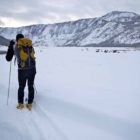 Derek Collins takes in the view while skiing across Yellowstone National Park.