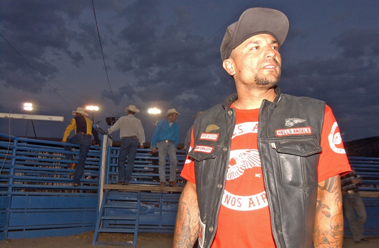 Hells Angels member Jose G. participated in a special bull-riding contest for the bikers at the Cody Nite Rodeo during the group's 2006 World Run in Cody, Wyo.