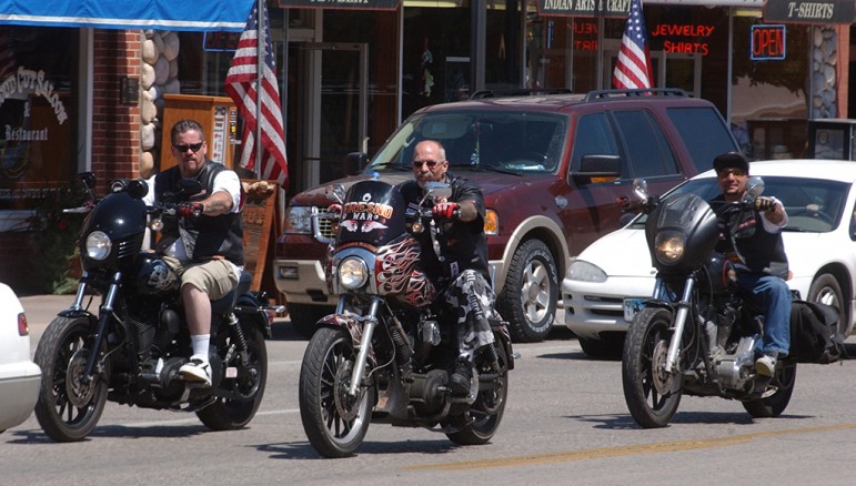 Hells Angels motorcycle club members cruise Sheridan Avenue in Cody, Wyo. during the group's 2006 World Run.
