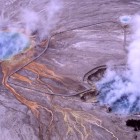 Steam rises from Excelsior Geyser Crater and Grand Prismatic Spring in Yellowstone National Park.
