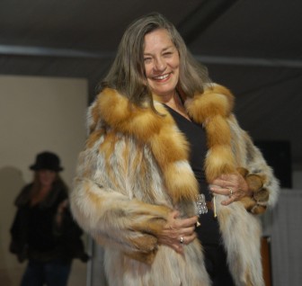 Mayor Nancy Tia Brown models a fur made by Joel Kaye during the Cody High Style Fashion show on Wednesday in Cody, Wyo.