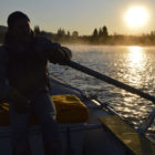 The sun rises over the Snake River in Grand Teton National Park.