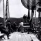 Visitors take in the view from atop the Old Faithful Inn in this undated Yellowstone National Park archival photo, likely from around 1910.