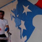 Artist Scott LaBaido is painting American flag murals on veterans' posts in all 50 states, including one in Cody, Wyo.