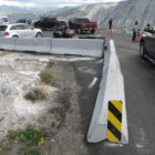 Temporary concrete barriers have been installed around a newly formed thermal feature at the Upper Terrace Drive in Yellowstone National Park.