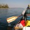 A canoeist paddles along the southeast arm of Yellowstone Lake in Yellowstone National Park.