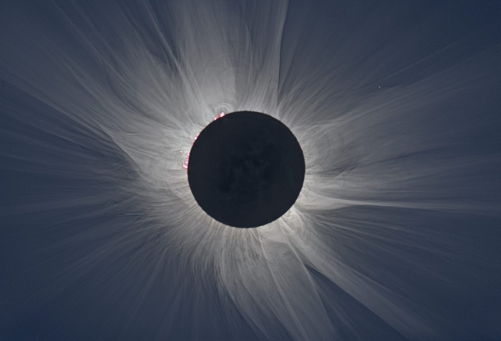Solar flares are visible in the sun's corona during a total solar eclipse. (NASA image)
